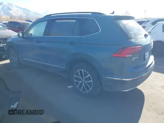 2021 Volkswagen Tiguan SE with VIN 3VV2B7AXXMM089913, listed as a IAAI auction lot 41402158 with 68,158 mi miles and . Bid and sale history available at DreamBid. Image 3.