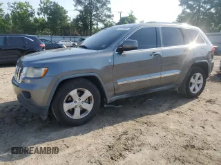 2011 Jeep Grand Cherokee Laredo z VIN 1J4RR4GG0BC738481, wystawiony jako Copart lot #57207665 z przebiegiem 222 978 mil mil oraz Czysty tytuł • Clean title. Historia ofert i sprzedaży dostępna na DreamBid. Obrazek 1.