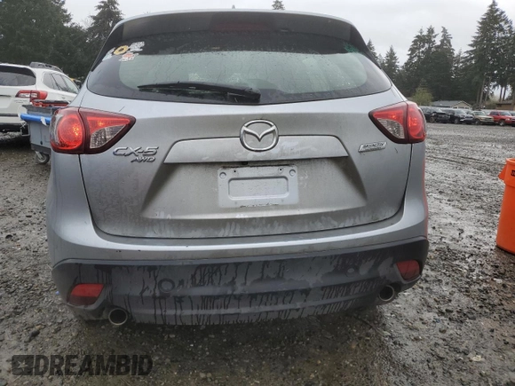 2016 Mazda CX-5 Sport z VIN JM3KE4BY5G0726376, wystawiony jako Copart lot #52009995 z przebiegiem 113 533 mil mil oraz Szkoda całkowita • Salvage title. Historia ofert i sprzedaży dostępna na DreamBid. Obrazek 6.
