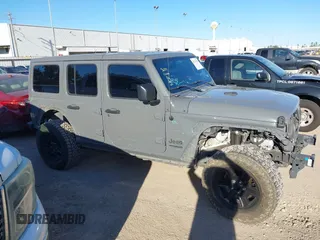 2018 Jeep Wrangler Unlimited Sahara with VIN 1C4HJXEG8JW239535, listed as a IAAI auction lot 41711596 with 85,675 mi miles. Bid and sale history available at carsss.com. Image 14.