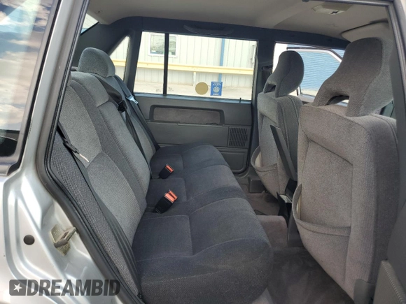 1994 Volvo 900 Action with VIN YV1JS831XR1164147, listed as a Copart auction lot 70037624 with 194,245 mi miles and Salvage title. Bid and sale history available at DreamBid. Image 10.