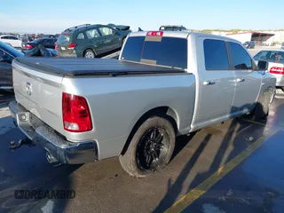 2014 Ram 1500 Big Horn with VIN 1C6RR6LT1ES180291, listed as a IAAI auction lot 40962366 with 131,763 mi miles and . Bid and sale history available at DreamBid. Image 4.