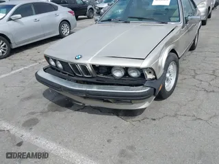 1985 BMW 6 Series 635CSi with VIN WBAEC8400F0610637, listed as a IAAI auction lot 41935412 with 129,943 mi miles. Bid and sale history available at carsss.com. Image 6.