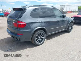 2012 BMW X5 35i z VIN 5UXZV4C53CL987556, wystawiony jako IAAI lot #42297756 z przebiegiem 190 922 mil mil oraz . Historia ofert i sprzedaży dostępna na DreamBid. Obrazek 4.