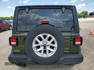 2023 Jeep Wrangler Sport S with VIN 1C4GJXAN7PW634914, listed as a Copart auction lot 63533355 with 39,490 mi miles and Salvage title. Bid and sale history available at DreamBid. Image 6.