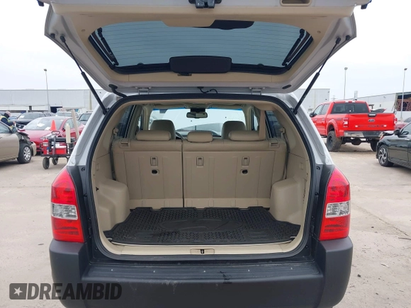 2007 Hyundai Tucson SE with VIN KM8JN12D57U670203, listed as a IAAI auction lot 41619422 with 92,450 mi miles. Bid and sale history available at carsss.com. Image 18.