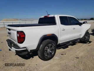 2024 GMC Canyon 4WD AT4 with VIN 1GTP6DEK1R1144016, listed as a Copart auction lot 74384234 with 112 mi miles and Salvage Title. Bid and sale history available at carsss.com. Image 3.