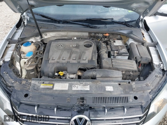 2014 Volkswagen Passat SEL Premium z VIN 1VWCN7A34EC091762, wystawiony jako IAAI lot #41769129 z przebiegiem 106 779 mil mil oraz . Historia ofert i sprzedaży dostępna na DreamBid. Obrazek 10.