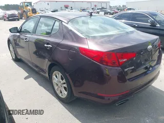 2013 Kia Optima EX with VIN 5XXGN4A7XDG177274, listed as a IAAI auction lot 42759090 with 164,212 mi miles and . Bid and sale history available at DreamBid. Image 3.