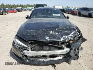 2020 BMW 5 Series M550i xDrive z VIN WBAJS7C01LCD23365, wystawiony jako Copart lot #49166705 z przebiegiem 42 293 mil mil oraz Szkoda całkowita • Salvage title. Historia ofert i sprzedaży dostępna na DreamBid. Obrazek 5.