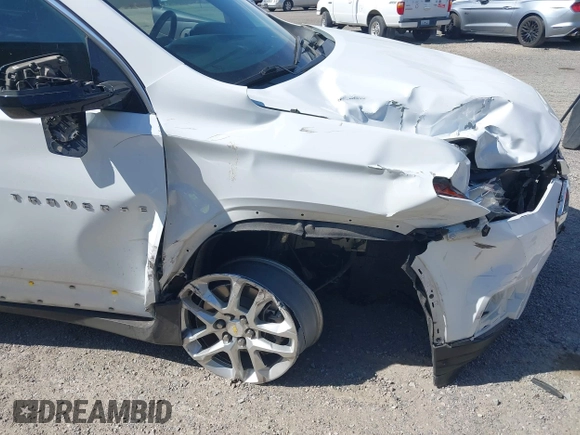 2020 Chevrolet Traverse LS with VIN 1GNERFKW0LJ303818, listed as a IAAI auction lot 42170427 with 67,517 mi miles and . Bid and sale history available at DreamBid. Image 6.