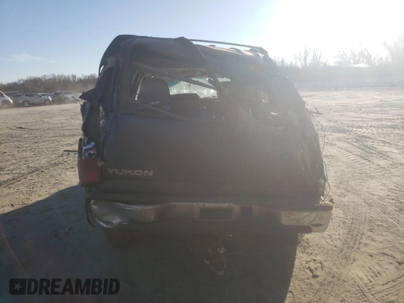 2002 GMC Yukon SLT with VIN 1GKEK13Z62J148557, listed as a Copart auction lot 43246075 with 242,968 mi miles and Salvage Title. Bid and sale history available at carsss.com. Image 6.