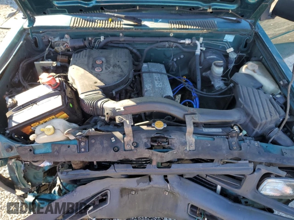 1996 Nissan Frontier XE with VIN 1N6SD16Y9TC338402, listed as a Copart auction lot 45058765 with 164,295 mi miles and Salvage title. Bid and sale history available at DreamBid. Image 12.