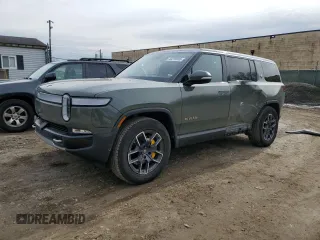 2022 Rivian R1S Launch Edition with VIN 7PDSGABL4NN000393, listed as a Copart auction lot 44218005 with 26,598 mi miles and Salvage Title. Bid and sale history available at carsss.com. Image 1.