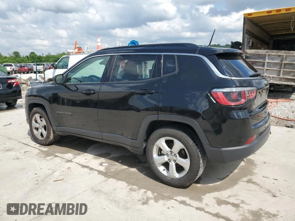 2017 Jeep Compass Latitude with VIN 3C4NJCBB0HT611440, listed as a Copart auction lot 57401485 with 128,319 mi miles and Salvage title. Bid and sale history available at DreamBid. Image 2.