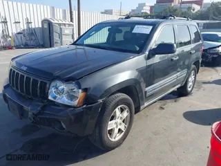 2005 Jeep Grand Cherokee Laredo with VIN 1J8GS48K95C615330, listed as a IAAI auction lot 41719101 with 152,186 mi miles. Bid and sale history available at carsss.com. Image 17.