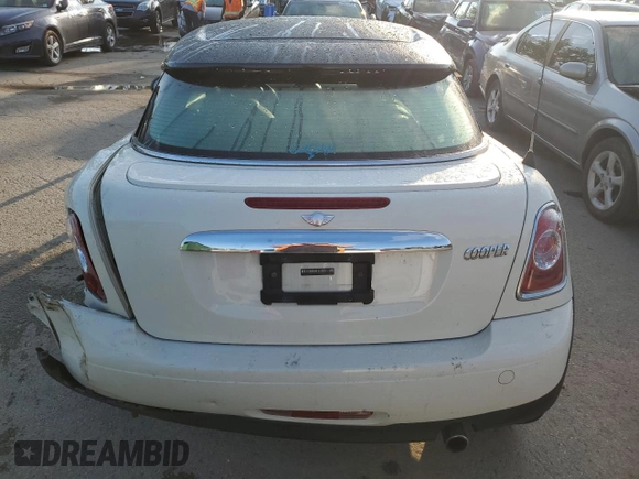 2014 MINI Cooper Coupe with VIN WMWSX1C5XET508092, listed as a Copart auction lot 65966804 with 113,790 mi miles and Salvage Title. Bid and sale history available at carsss.com. Image 6.
