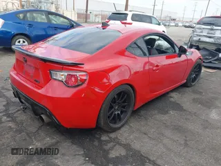 2016 Scion FR-S with VIN JF1ZNAA11G9709120, listed as a IAAI auction lot 41361502 with 74,281 mi miles. Bid and sale history available at carsss.com. Image 4.