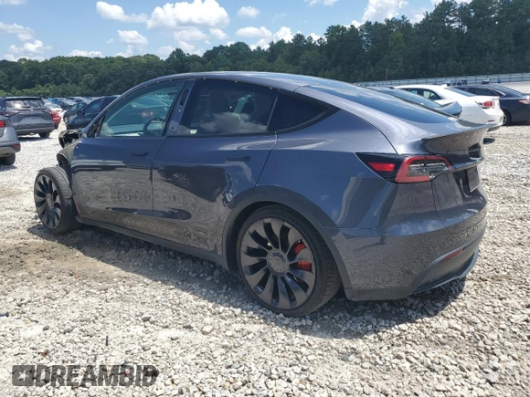 2022 Tesla Model Y Performance with VIN 7SAYGDEF3NF532311, listed as a Copart auction lot 62997535 with 60,530 mi miles and Salvage title. Bid and sale history available at DreamBid. Image 2.