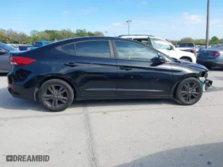 2017 Hyundai Elantra SE with VIN KMHD84LF6HU104395, listed as a IAAI auction lot 41644485 with 164,840 mi miles. Bid and sale history available at carsss.com. Image 14.