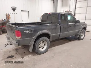 2000 Ford Ranger XLT with VIN 1FTZR15X2YPB86720, listed as a IAAI auction lot 41501141 with 211,794 mi miles. Bid and sale history available at carsss.com. Image 4.