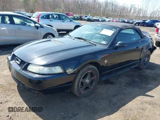 2000 Ford Mustang with VIN 1FAFP444XYF181018, listed as a IAAI auction lot 41943486 with 212,996 mi miles. Bid and sale history available at carsss.com. Image 2.