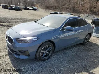 2023 BMW 2 Series 228i xDrive with VIN WBA73AK05P7M55059, listed as a Copart auction lot 49292115 with 14,704 mi miles and Salvage Title. Bid and sale history available at carsss.com. Image 1.