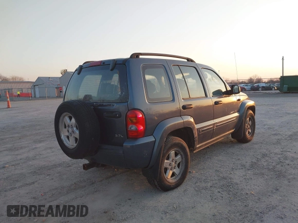 2002 Jeep Liberty Limited with VIN 1J4GL58K42W319050, listed as a IAAI auction lot 41767135 with 158,515 mi miles and . Bid and sale history available at carsss.com. Image 4.