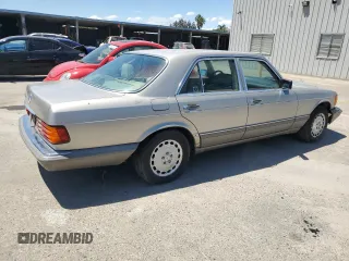 1990 Mercedes-Benz 300 with VIN WDBCA24D1LA529716, listed as a Copart auction lot 56581335 with 122,286 mi miles and Salvage Title. Bid and sale history available at DreamBid. Image 3.