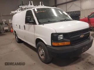 2015 Chevrolet Express Cargo Van with VIN 1GCWGFCF9F1167677, listed as a IAAI auction lot 42018087 with 148,263 mi miles. Bid and sale history available at carsss.com. Image 1.