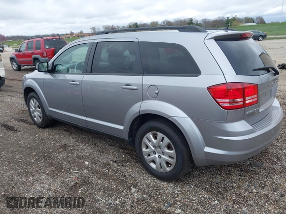 2016 Dodge Journey SE with VIN 3C4PDCAB4GT230643, listed as a IAAI auction lot 39127555 with 102,756 mi miles. Bid and sale history available at carsss.com. Image 3.