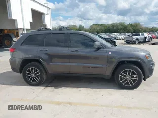 2018 Jeep Grand Cherokee Trailhawk with VIN 1C4RJFLG8JC427345, listed as a IAAI auction lot 41557222 with 49,469 mi miles and . Bid and sale history available at DreamBid. Image 13.