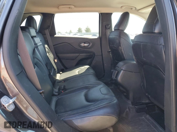 2014 Jeep Cherokee Limited z VIN 1C4PJMDS1EW170001, wystawiony jako Copart lot #57645655 z przebiegiem 154 098 mil mil oraz Szkoda całkowita • Salvage title. Historia ofert i sprzedaży dostępna na DreamBid. Obrazek 11.
