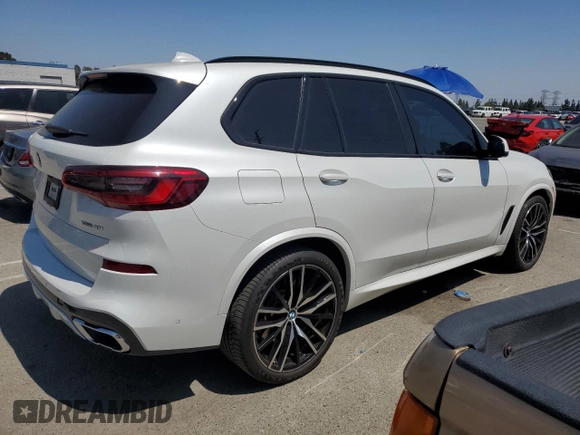2019 BMW X5 xDrive40i with VIN 5UXCR6C57KLK85504, listed as a Copart auction lot 60908665 with 21,333 mi miles and Salvage title. Bid and sale history available at DreamBid. Image 3.