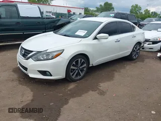 2016 Nissan Altima S z VIN 1N4AL3AP0GC174433, wystawiony jako IAAI lot #42257840 z przebiegiem 122 158 mil mil oraz . Historia ofert i sprzedaży dostępna na DreamBid. Obrazek 2.