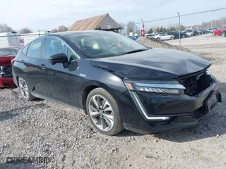 2018 Honda Clarity Plug-In Hybrid with VIN JHMZC5F12JC017148, listed as a IAAI auction lot 41829504 with 98,382 mi miles. Bid and sale history available at carsss.com. Image 1.