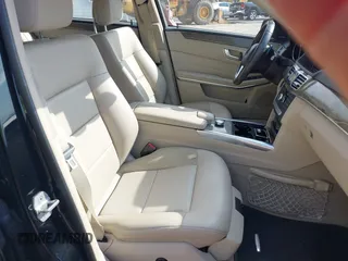 2014 Mercedes-Benz E E 350 Luxury with VIN WDDHF8JB2EA894977, listed as a IAAI auction lot 42065062 with 197,393 mi miles. Bid and sale history available at carsss.com. Image 5.