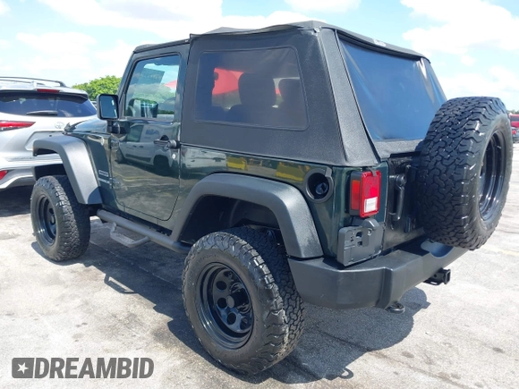 2010 Jeep Wrangler Sport with VIN 1J4AA2D17AL126737, listed as a IAAI auction lot 42237596 with 119,391 mi miles and . Bid and sale history available at carsss.com. Image 3.