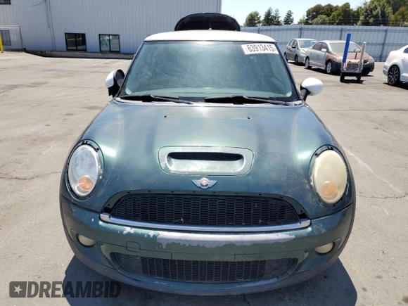 2009 MINI Hardtop S with VIN WMWMF73599TT96423, listed as a Copart auction lot 63913415 with 103,165 mi miles and Clean title. Bid and sale history available at DreamBid. Image 5.