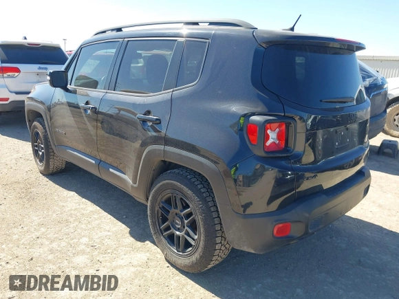 2016 Jeep Renegade Latitude with VIN ZACCJBBT1GPD65532, listed as a IAAI auction lot 41642242 with 124,608 mi miles. Bid and sale history available at carsss.com. Image 3.