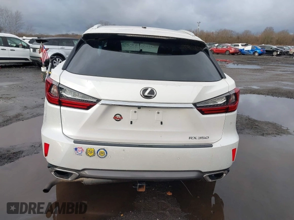 2017 Lexus RX with VIN 2T2BZMCA0HC101451, listed as a IAAI auction lot 41178229 with 61,756 mi miles. Bid and sale history available at carsss.com. Image 16.