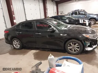 2017 Kia Optima LX with VIN 5XXGT4L31HG165150, listed as a IAAI auction lot 40985407 with 154,945 mi miles. Bid and sale history available at carsss.com. Image 12.