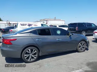 2018 Nissan Maxima Platinum z VIN 1N4AA6AP1JC388815, wystawiony jako IAAI lot #42098902 z przebiegiem 80 677 mil mil oraz . Historia ofert i sprzedaży dostępna na DreamBid. Obrazek 13.