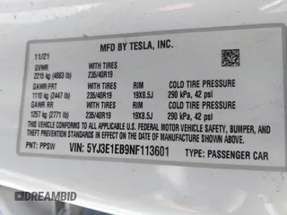2022 Tesla Model 3 Long Range z VIN 5YJ3E1EB9NF113601, wystawiony jako IAAI lot #42173612 z przebiegiem 95 454 mil mil oraz . Historia ofert i sprzedaży dostępna na DreamBid. Obrazek 9.