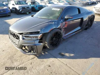 2017 Audi R8 z VIN WUAKBAFX6H7903367, wystawiony jako Copart lot #83113234 z przebiegiem 14 352 mil mil oraz Szkody całkowita. Historia ofert i sprzedaży dostępna na DreamBid. Obrazek 1.