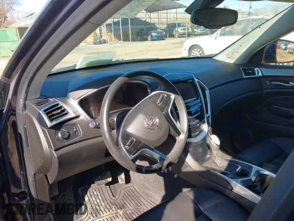 2015 Cadillac SRX with VIN 3GYFNAE35FS608595, listed as a IAAI auction lot 41282751 with 127,055 mi miles and . Bid and sale history available at DreamBid. Image 18.