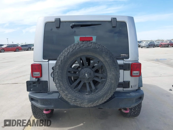 2015 Jeep Wrangler Unlimited Rubicon Hard Rock с VIN 1C4HJWFG6FL762537, выставлен на аукционе IAAI как лот 41792066 с пробегом 125 829 миль миль и . История ставок и продаж доступна на DreamBid. Изображение 16.