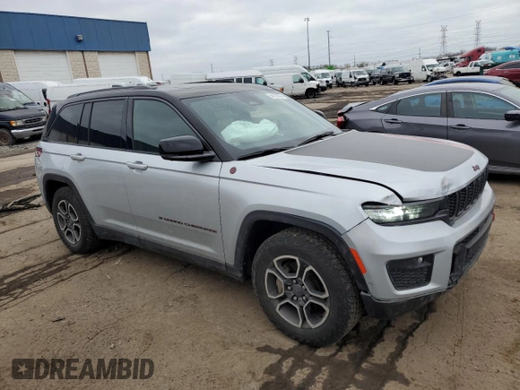 2022 Jeep Grand Cherokee Trailhawk with VIN 1C4RJHCG3N8625934, listed as a Copart auction lot 84533024 with 19,979 mi miles and Salvage title. Bid and sale history available at DreamBid. Image 4.