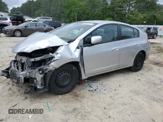 2010 Honda Insight LX with VIN JHMZE2H50AS029457, listed as a Copart auction lot 63660725 with 139,158 mi miles and Salvage title. Bid and sale history available at DreamBid. Image 1.