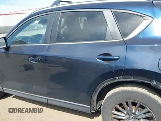 2017 Mazda CX-5 Touring z VIN JM3KFBCL5H0133493, wystawiony jako IAAI lot #39666644 z przebiegiem 125 048 mil mil oraz . Historia ofert i sprzedaży dostępna na DreamBid. Obrazek 15.